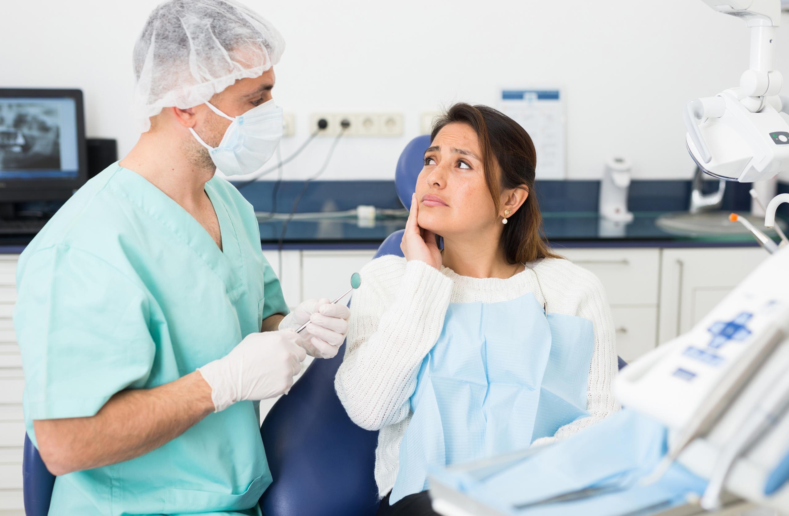 Woman Complains Of Toothache To Dentist